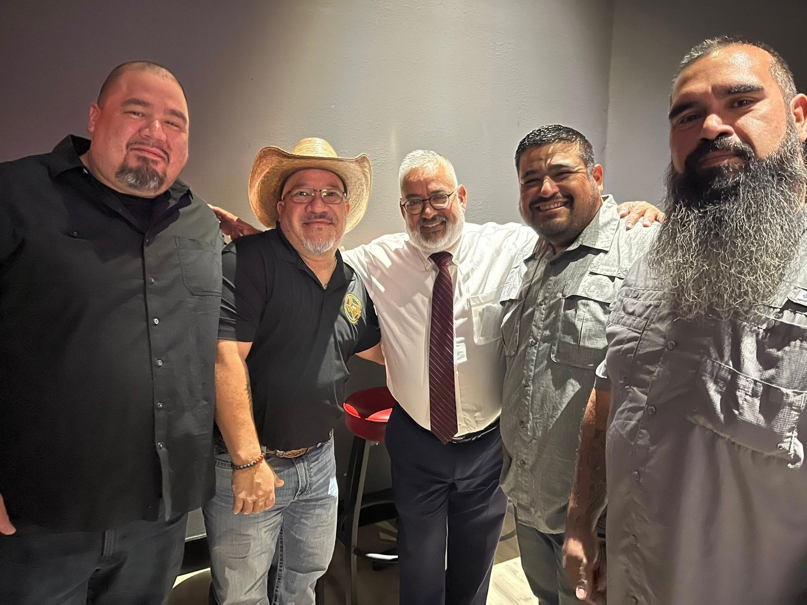 Stephen Longoria with community members at a Fort Bend event